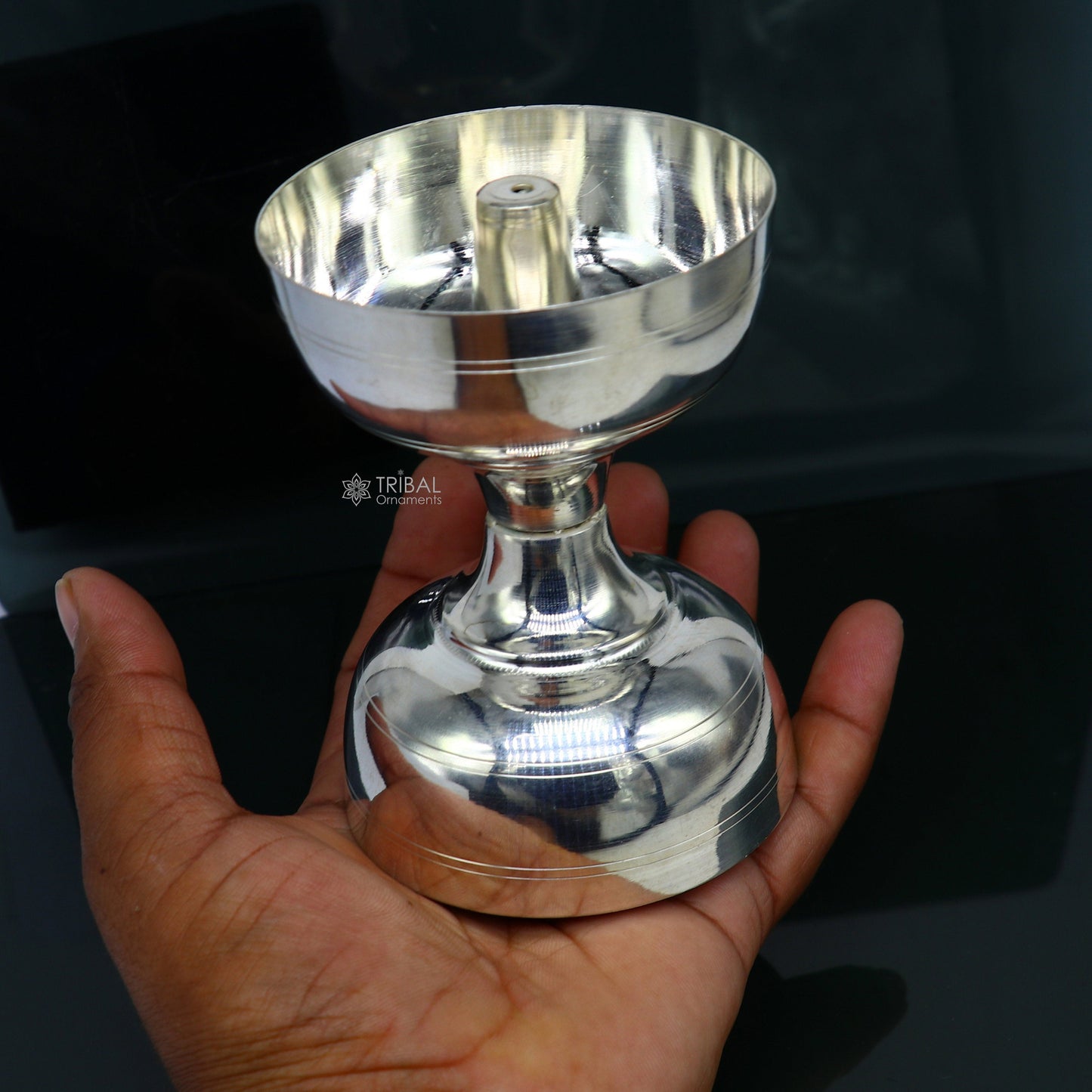 Handmade 925 sterling silver oil lamp with intricate design, used as a diya or puja utensil for home temple rituals.