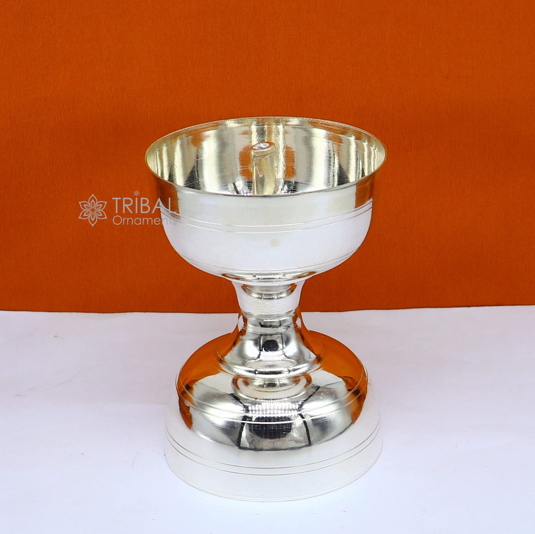 Handmade 925 sterling silver oil lamp with intricate design, suitable for home temple puja, crafted by Tribal Ornaments.