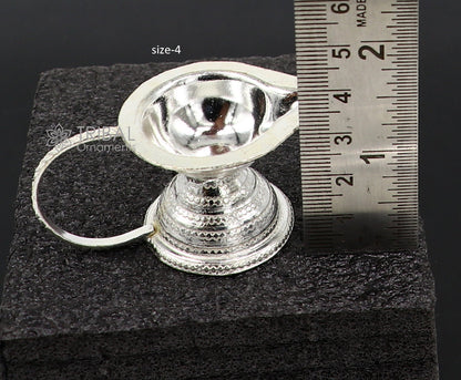 Handmade 925 silver kappor dani and diya set with temple utensils and a single joth kapoor for Aarti, crafted by Tribal Ornaments.