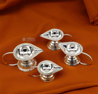 Handmade 925 sterling silver kappor dani, diya, and joth kapoor Aarti lamp from Tribal Ornaments, detailed silver temple utensils.