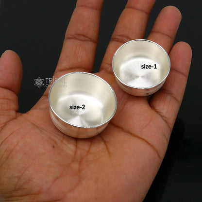 Small handmade silver puja bowl, traditional temple accessory crafted from 999 fine solid silver, used for religious offerings.