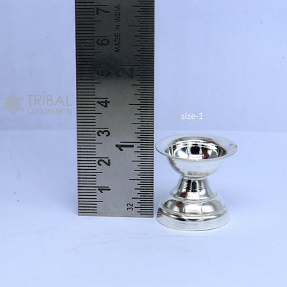Handmade 925 sterling silver oil lamp with intricate designs, ideal for home temple puja and traditional silver diya decor.