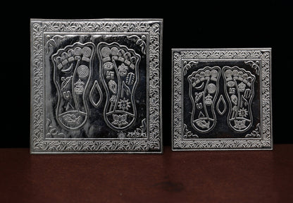 Handmade 925 sterling silver Shree Lakshmi charan paduka for home temple puja, detailed divine silver religious article.