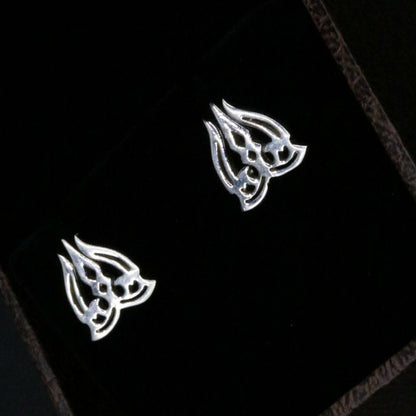 Silver Shiva idol stud earring featuring a trident design, crafted by TRIBAL ORNAMENTS, for stylish men's jewelry.