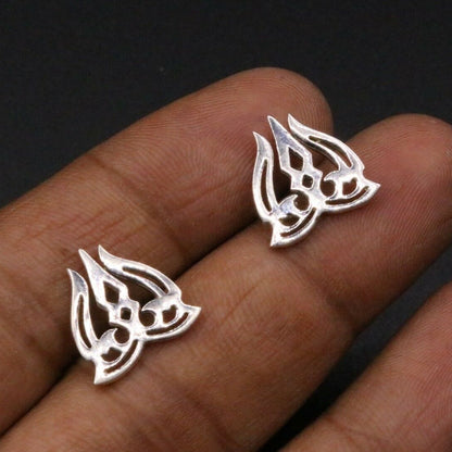 Silver Shiva idol stud earring with trident design, featuring intricate tribal ornament craftsmanship for men.
