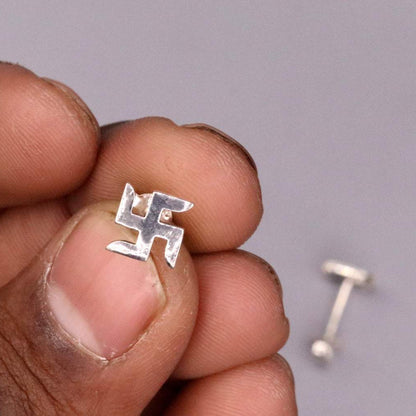Sterling silver handmade swastika stud earring by TRIBAL ORNAMENTS, unisex Indian idol symbol jewelry.