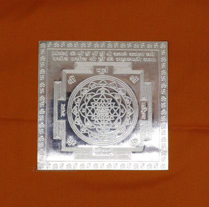 Handmade 925 sterling silver Shree Yantra and Shri Laxmi Yantra for wealth and prosperity, perfect for puja or gifting.