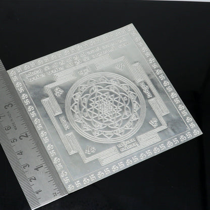 Handmade 925 sterling silver Shree Yantra and Shri Laxmi Yantra for wealth and prosperity, crafted as a traditional puja gift.