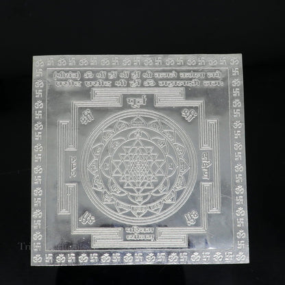 Handmade 925 sterling silver Shree Yantra and Shri Laxmi Yantra for wealth and prosperity, ideal for puja and gifting.