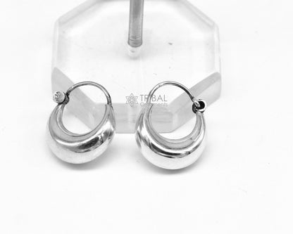 Sterling silver tribal-style hoops earrings by TRIBAL ORNAMENTS, shiny, lightweight, unisex Indian traditional jewelry.
