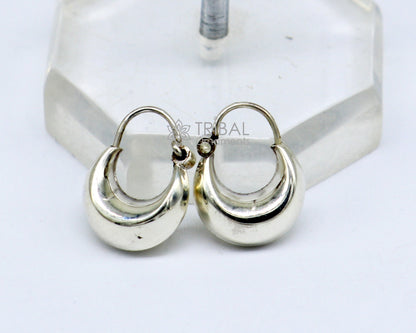 Unisex Indian traditional 925 sterling silver shiny hoop earrings with a simple, trendy design and lightweight feel.