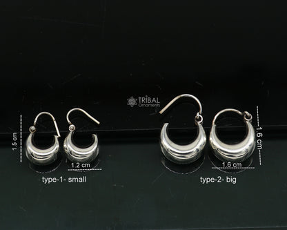 Shiny 925 sterling silver tribal-style unisex hoop earrings, traditional Indian design, lightweight and trendy jewelry by TRIBAL ORNAMENTS.