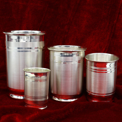 Handmade 999 fine silver water and milk glass tumbler set by TRIBAL ORNAMENTS, includes silver utensils and baby food dining set.