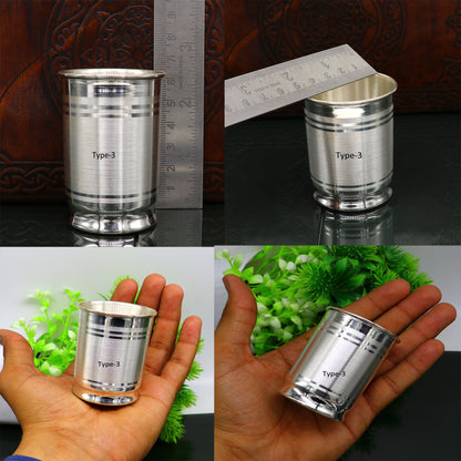 Handmade 999 fine silver water and milk glass tumbler set by TRIBAL ORNAMENTS, includes all sizes and silver baby food utensils.