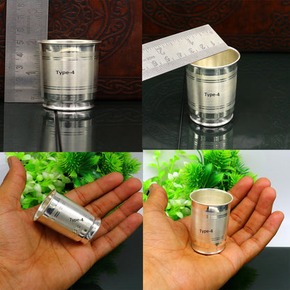 Handmade 999 fine silver water and milk glass tumbler set by Tribal Ornaments, includes silver utensils and baby food dining set.