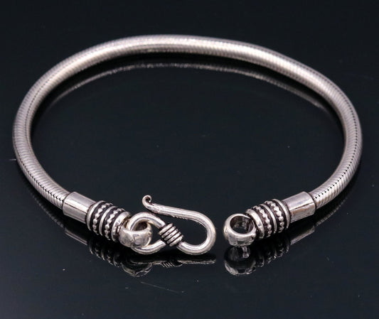 Elegant 4mm 925 sterling silver snake chain bracelet by TRIBALORNAMENT, flexible unisex jewelry with a sleek handmade design.