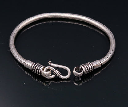 4mm sterling silver snake chain bracelet by TRIBALORNAMENT, flexible, handmade unisex jewelry with elegant design.