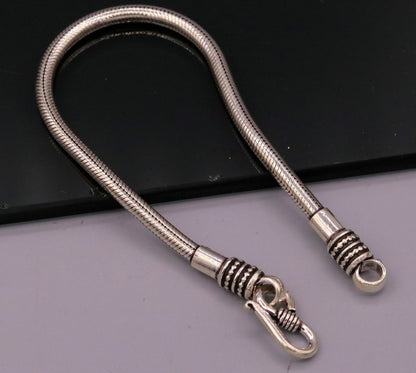 Sterling silver 4mm snake chain bracelet from TRIBALORNAMENT, flexible unisex jewelry with a sleek, elegant design.