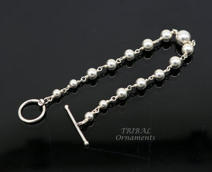 Sterling silver beaded customized bracelet by TRIBALORNAMENT, unisex jewelry with intricate beads, perfect for personalized gift-giving.