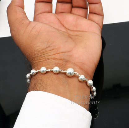 Sterling silver beaded customized bracelet by TRIBALORNAMENT, unisex jewelry with personalized design and stylish beaded accents.