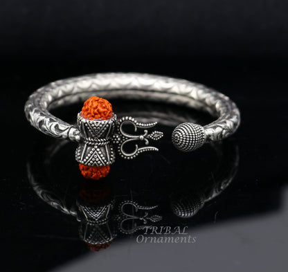 925 Sterling silver Lord Shiva trident bangle bracelet with handmade chitai work and natural Rudraksha beads from TRIBALORNAMENT.