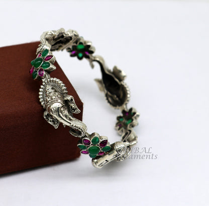 925 Sterling silver Ganesha bangle bracelet with floral red and green stones, ethnic jewelry by TRIBALORNAMENT.