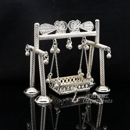 Handmade 925 sterling silver Bal Gopala jhula depicting Little Krishna on a swing, detailed silver art by TribalOrnaments.