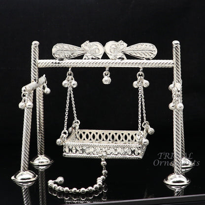 Handmade 925 silver Bal Gopala jhula featuring Little Krishna swing, crafted by TribalOrnaments with detailed silver art.