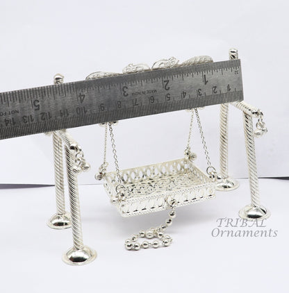 925 Sterling silver handmade Bal Gopala jhula depicting Little Krishna on a swing, detailed silver art for child Krishna palana.