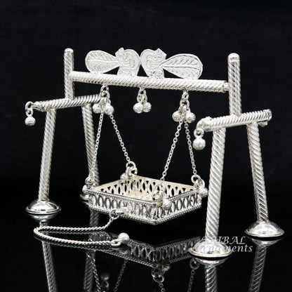 925 Sterling silver handmade Bal Gopala jhula depicting Little Krishna swing and child Krishna Palana in intricate silver art style.
