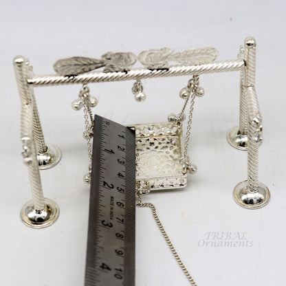 Sterling silver handmade Bal Gopala Krishna swing, detailed child Krishna jhula with intricate silver art craftsmanship.