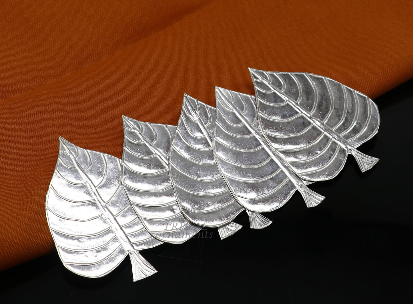 Set of 5 handmade 925 sterling silver pipal leaf puja articles by TribalOrnaments, crafted for religious rituals and offerings.