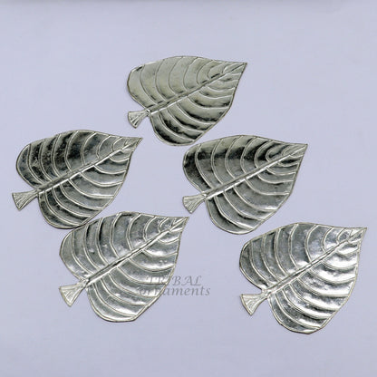Set of 5 handmade 925 sterling silver pipal leaf puja articles by TribalOrnaments, intricate silver religious decorative pieces.