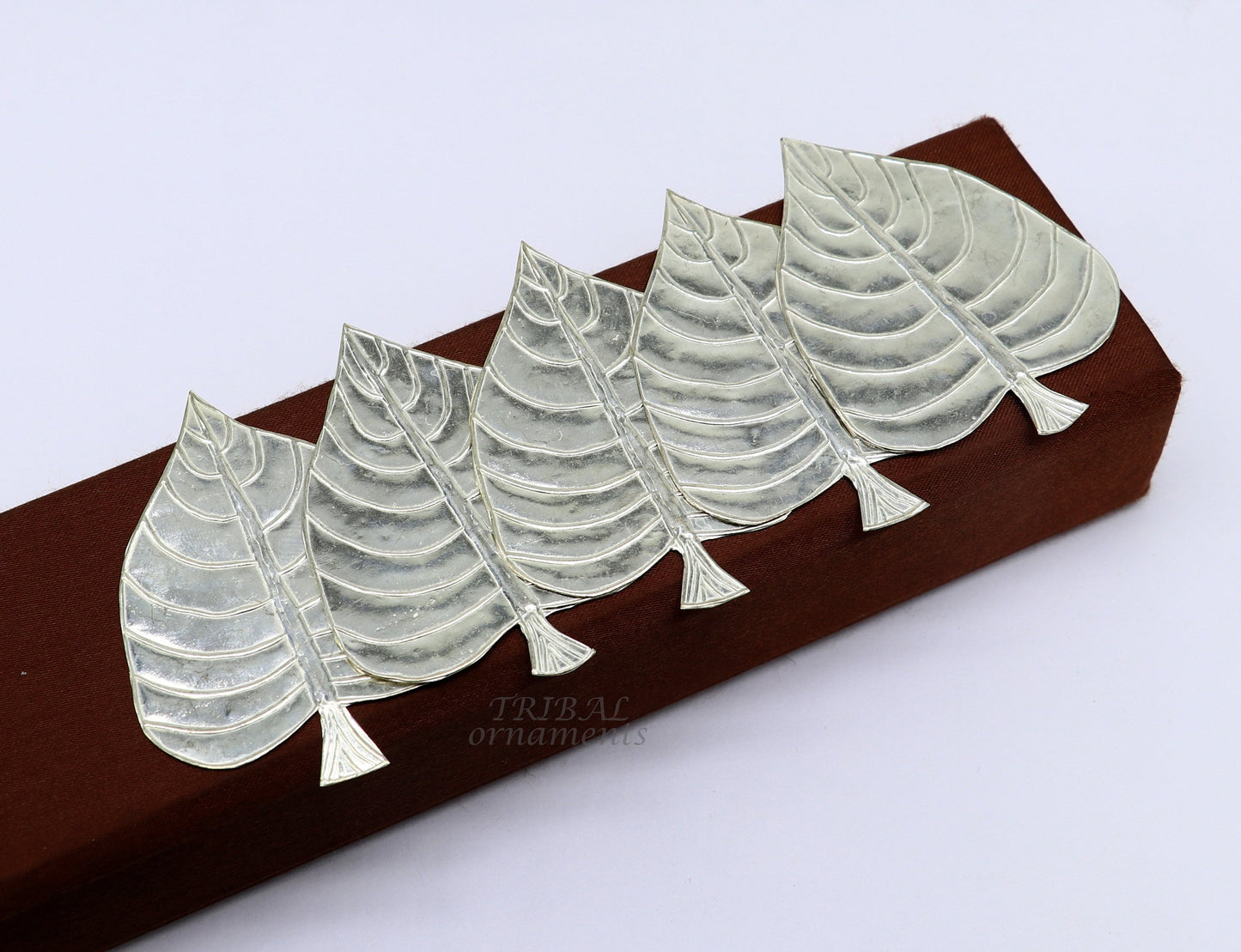 Set of 5 handmade 925 sterling silver pipal leaf puja articles by TribalOrnaments, featuring detailed silver leaf designs.
