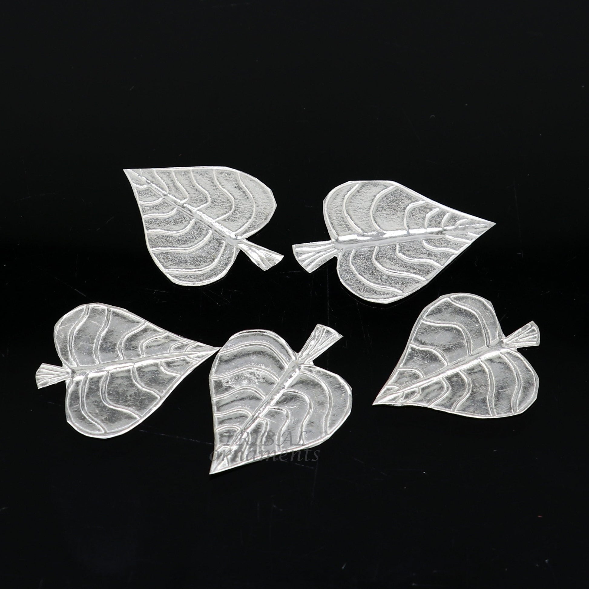 Set of 5 handmade 925 sterling silver pipal leaf puja articles by TribalOrnaments, crafted for spiritual rituals and offerings.