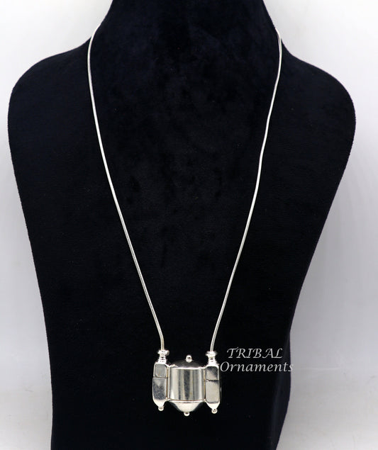 Sterling silver vintage Shiva Lingam pendant in a casket box, featuring intricate tribal design and ethnic Indian craftsmanship.