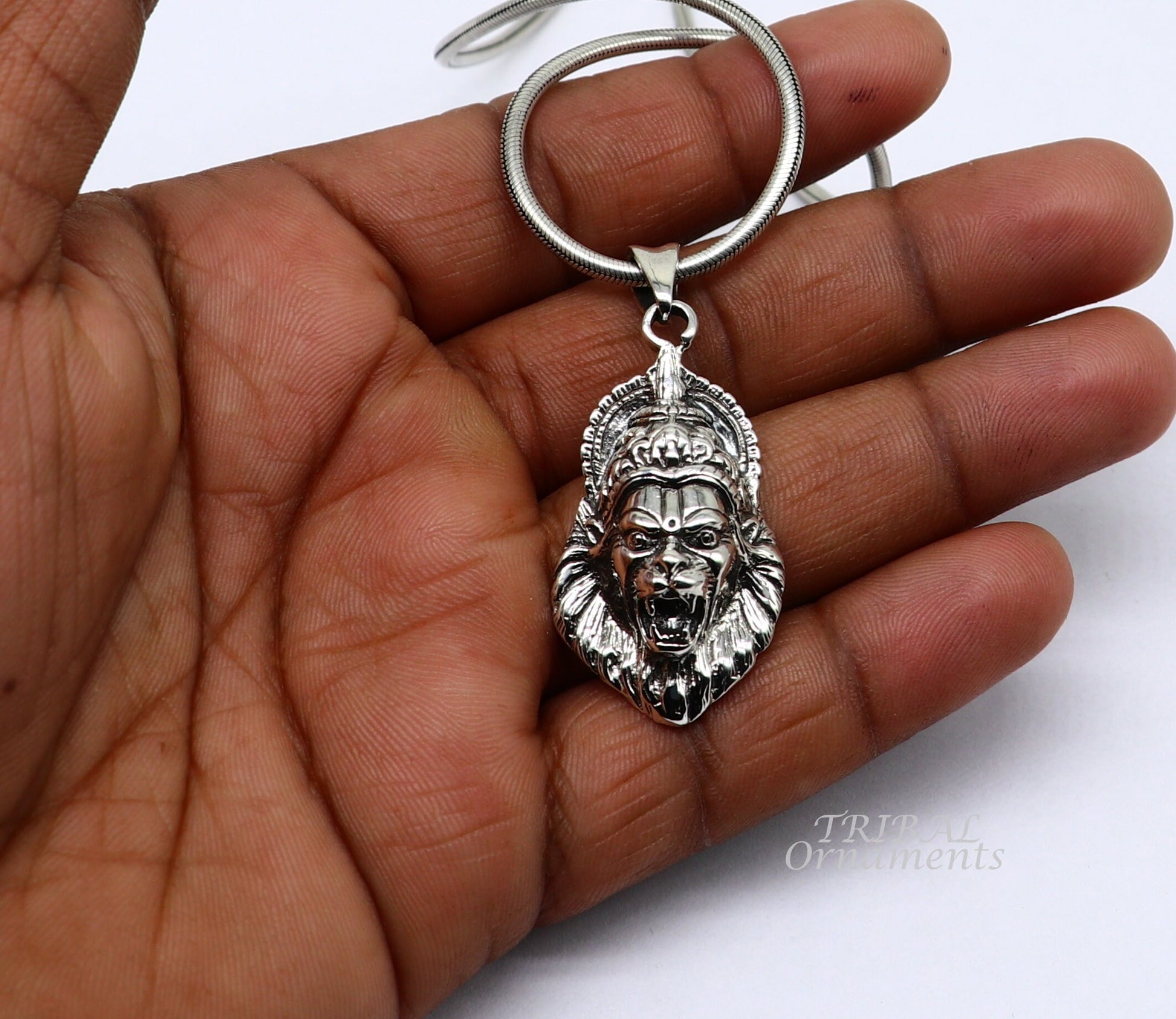 Sterling silver Vishnu Narasimha pendant featuring a detailed idol design, oxidized finish, suitable for necklaces or gifting.